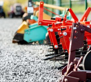 New plows for farming on the open ground of agricultural shop