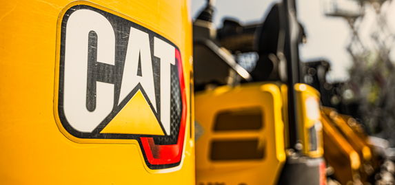 close view of cat excavator logo from trs equipment rental