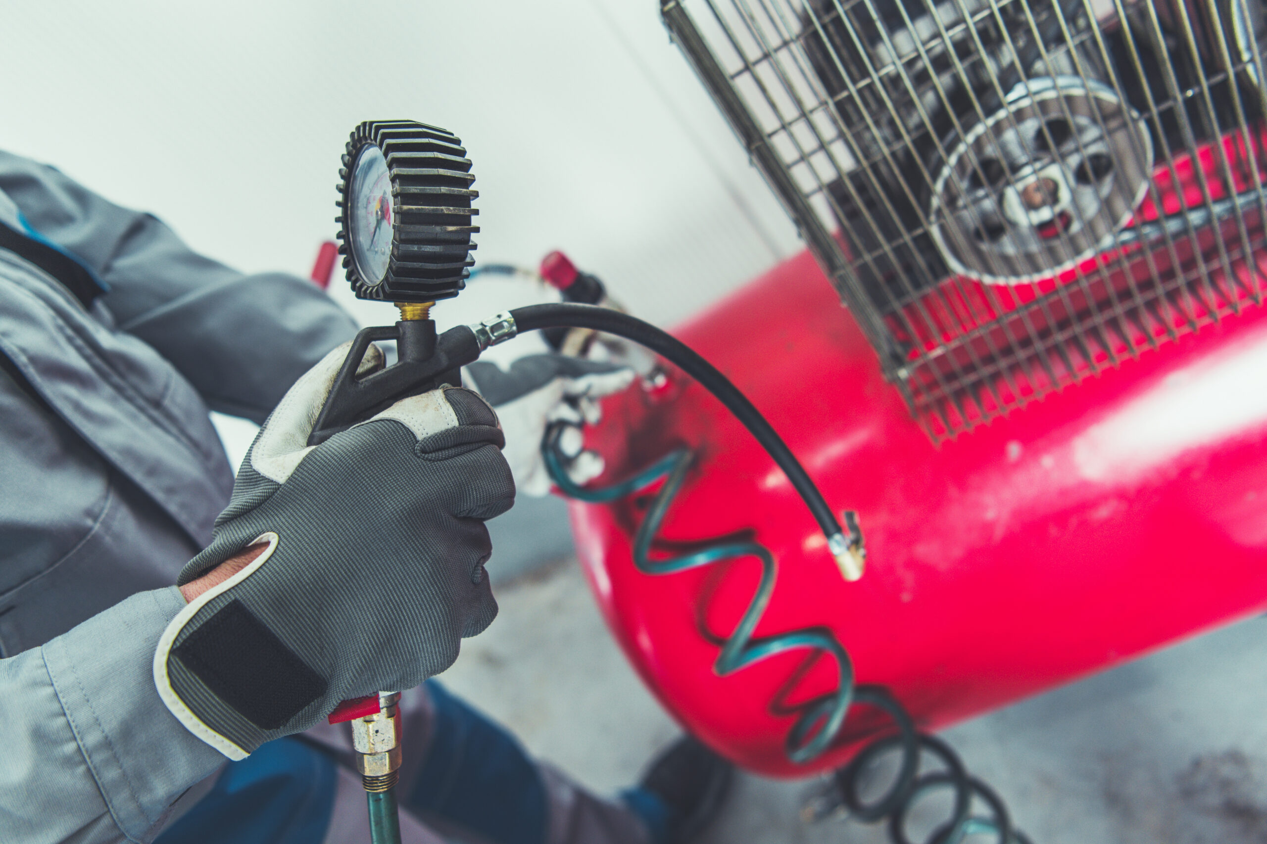 air compressor used by a man rented from trs equipment rental