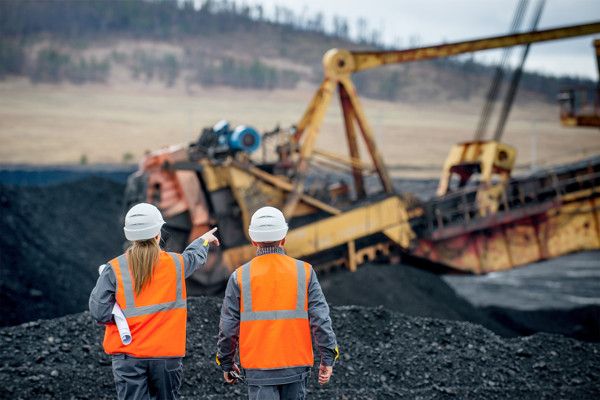 construction equipment rental in tucson with two contractors talking about the project
