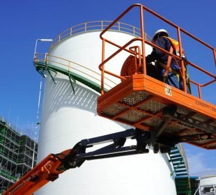 a man on a rented aerial lift